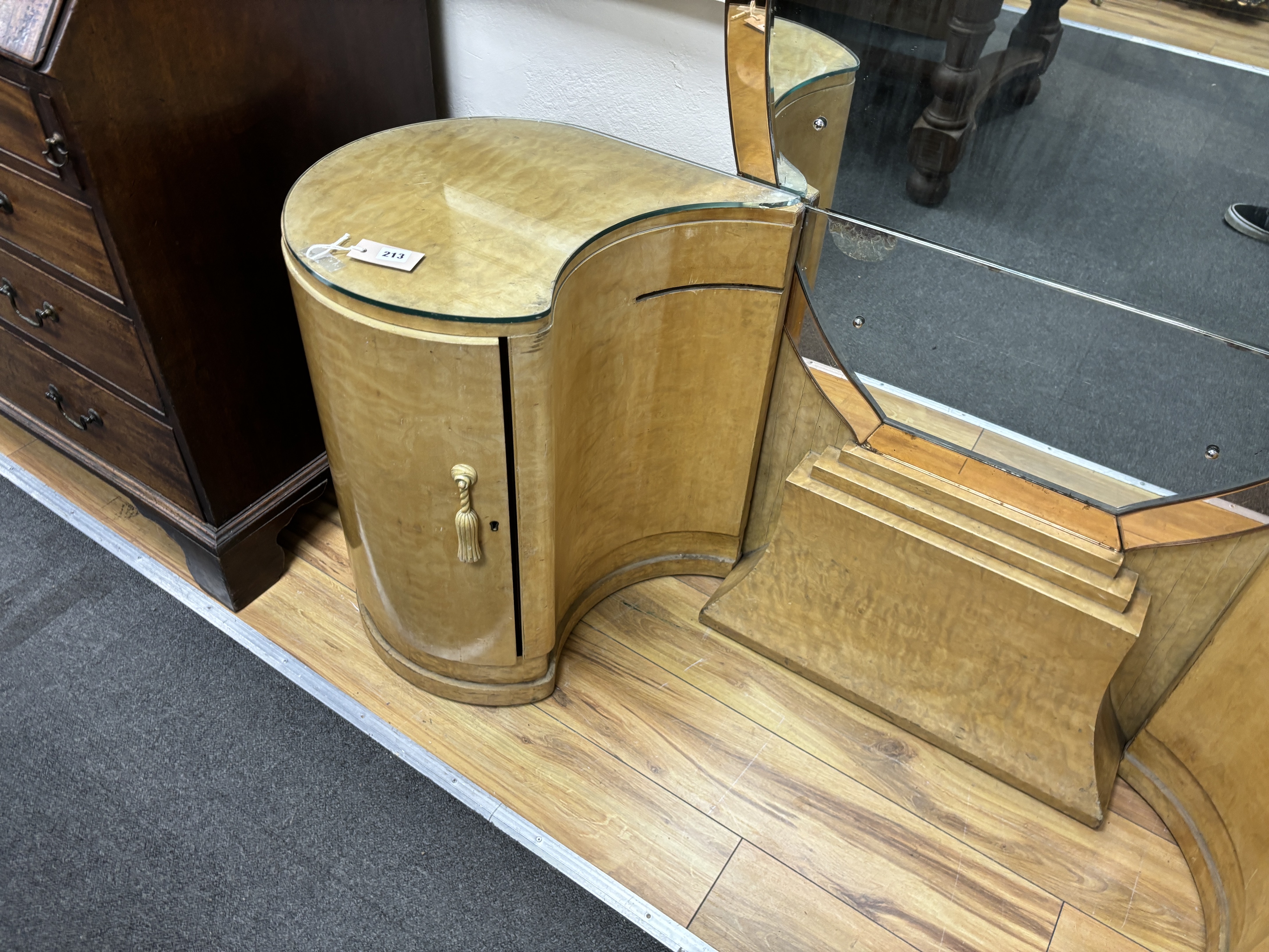 An Art Deco dressing table, width 162cm, depth 45cm, height 154cm. Condition - fair